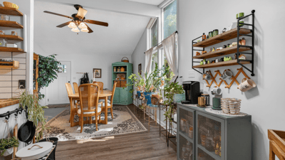 Bright and airy dining area featuring ample natural light and a cozy atmosphere for gatherings.