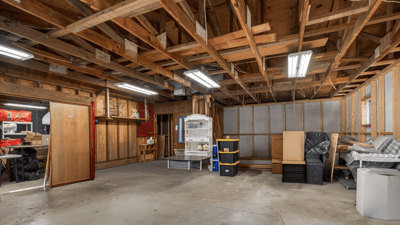 Spacious workshop with open layout, ready for customization and ideal for storage or workshop projects.