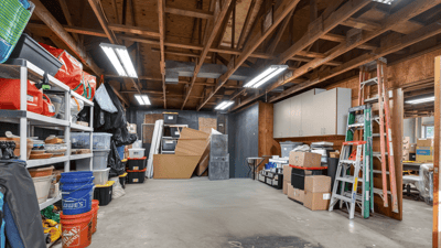 Spacious and versatile garage featuring ample storage solutions and a flexible layout for various projects.