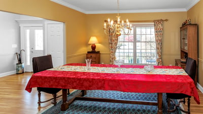 Formal Dining Room
features crown molding and chair rail.