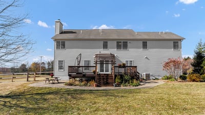 The view from the yard to the home highlights the attractive, enjoyable outdoor space.