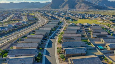 Aerial shot that showcases community greenbelt access along with well-maintained homes. Perfect for buyers seeking walkability and natural beauty.