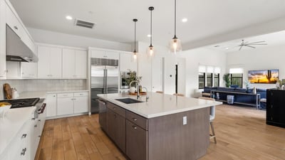 High-end kitchen with premium appliances, quartz surfaces, and sleek cabinetry. A standout feature for Scottsdale buyers who value luxury and functionality.