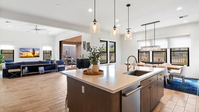Light-filled great room with expansive proportions, modern finishes, and seamless flow to adjacent living spaces. Designed for Scottsdale buyers who value openness and style.