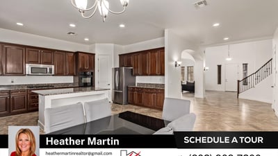 This open layout connects the kitchen to the living areas for easy entertaining. Granite countertops, recessed lighting, and modern flooring add comfort and style to this Glendale home.