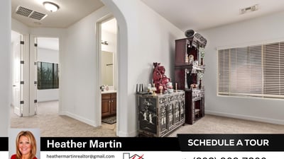Filled with natural light, this loft area offers flexibility for modern living needs. Plush carpeting and open railing details contribute to the comfortable layout of this Glendale residence.