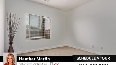 This well-lit bedroom includes a ceiling fan and generous window views. Part of a spacious Glendale home offering modern layout and private backyard pool.