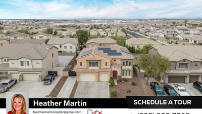 Drone perspective highlights the tile roof, 3-car garage, and solar energy system. This Glendale home offers impressive exterior design and energy-efficient features.