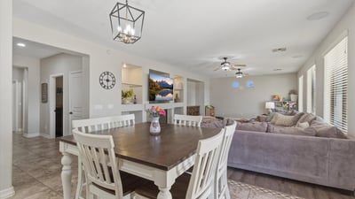 Dining space positioned between the kitchen and great room, allowing seamless flow for meals, gatherings, and entertaining.