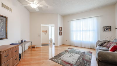 Large bonus room with natural light and open layout, perfect for a home office, hobby room, or additional living space.
