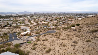 Unforgettable panoramic views overlook the Phoenix valley from this rare hillside lot near South Mountain Preserve. Experience vibrant sunsets, sparkling city lights, and endless desert beauty from every angle.