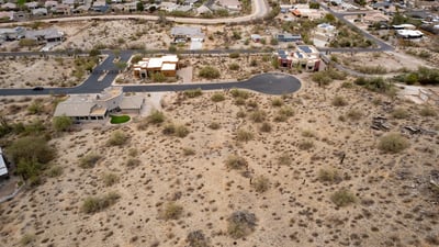 Peaceful hillside neighborhood surrounded by mountain landscapes and upscale custom homes. This elevated Phoenix homesite offers stunning views and a tranquil desert lifestyle.