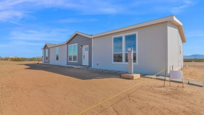 Enjoy wide-open Arizona living in this newly constructed home on over 2 acres in Wittmann. Surrounded by mountain views and desert scenery, this property offers privacy, flexibility, and room for horses, RVs, and future improvements.