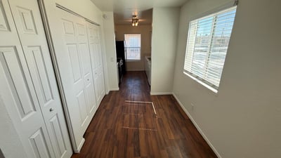 Bright dining space accented by large windows and attractive flooring. Conveniently positioned between the living area and kitchen, it creates an ideal flow for daily living and entertaining.