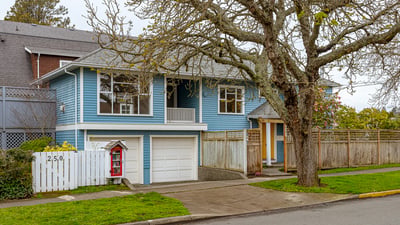Inviting split-level home with a garage, spacious yard, and a welcoming atmosphere near local amenities.