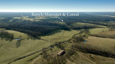 View looking west over the ranch manager home across the central pasture toward Bentonville corridor