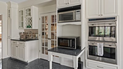 Modern kitchen featuring sleek cabinetry, high-end appliances, and ample counter space for culinary pursuits.