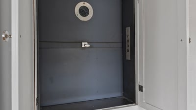 This unique built-in storage space offers convenient organization for your home essentials.