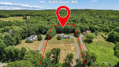 Spacious property on 106 Gorham Pond Rd offers abundant land and picturesque views in Goffstown, NH.