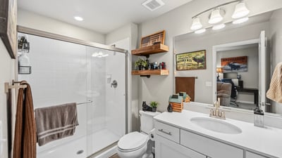 Jr Suite in basement with attached bathroom.