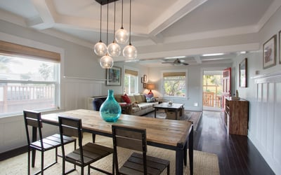 Dining area flows from kitchen into living room. Open floor plan.