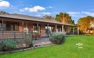 Spacious outdoor area complements this inviting home, perfect for entertaining and enjoying nature’s beauty.