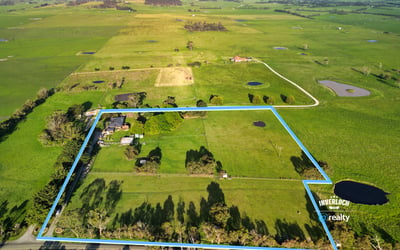 Spacious rural property with ample land, scenic views, and potential for agricultural or recreational use.