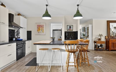 Modern kitchen with a spacious island, perfect for entertaining and everyday functionality, awaits your culinary creativity.