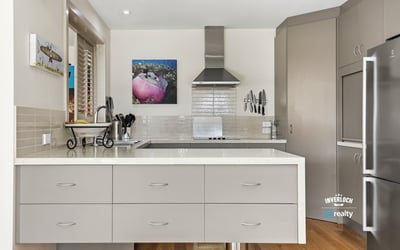 Modern kitchen featuring sleek cabinetry, high-end appliances, and an inviting layout perfect for cooking and entertaining.