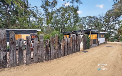 Discover a unique property with rustic fencing, surrounded by nature and offering a peaceful retreat.