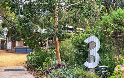 Nestled in lush greenery, this property offers a unique blend of comfort and natural beauty.