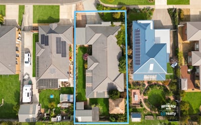 Spacious property featuring modern amenities, landscaped outdoor areas, and ample parking in a desirable neighborhood.