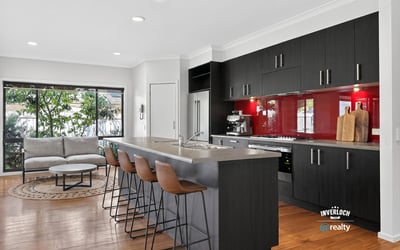 Contemporary kitchen featuring sleek cabinetry, a spacious island, and an open layout perfect for entertaining.