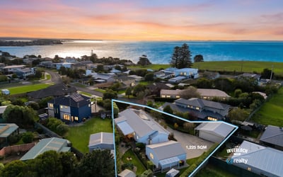 Expansive 1,225 sqm property with stunning ocean views and ample outdoor space for potential development.
