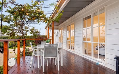 Inviting outdoor space with string lights, perfect for entertaining or relaxing in the fresh air.