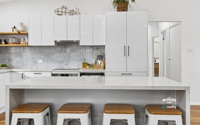 Modern kitchen featuring sleek cabinetry, a spacious island, and contemporary finishes perfect for entertaining.