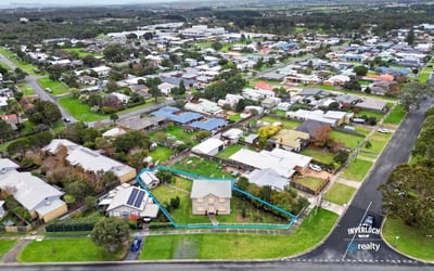 Spacious corner lot with ample outdoor space, surrounded by a vibrant community and convenient amenities.