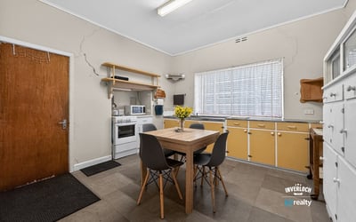 Bright and functional kitchen featuring ample storage, modern appliances, and a cozy dining area for gatherings.