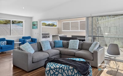 Bright and airy living space featuring modern furnishings and seamless indoor-outdoor flow for easy entertaining.