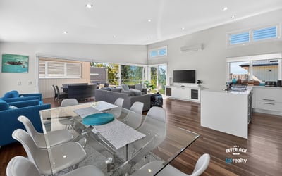 Bright and airy open-concept living space with modern furnishings and spectacular views. Perfect for entertaining.