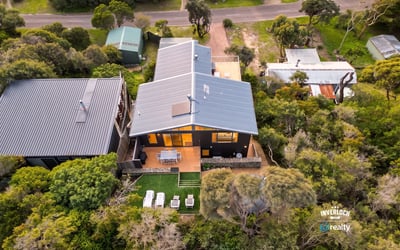Discover a unique retreat surrounded by lush greenery, offering modern comforts and outdoor living space.
