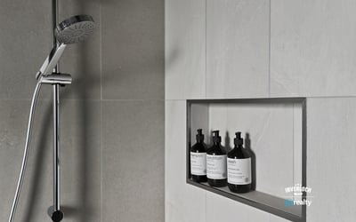 Modern shower featuring a sleek design and built-in niche for organized storage of essentials.
