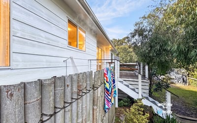 Contemporary home with outdoor space, natural light, and a unique blend of privacy and convenience.
