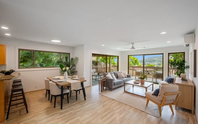 Bright and airy living space with panoramic views, seamless indoor-outdoor flow, and modern furnishings.