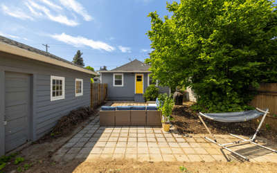 This property features a spacious outdoor area with a hot tub and ample room for relaxation.