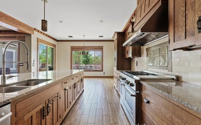 Light filled kitchen overlooking the outdoor living area, enhancing the home s indoor outdoor lifestyle. Large windows and premium finishes make this Phoenix space ideal for entertaining.