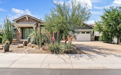 From the architectural stonework to desert garden landscaping, the front of this Phoenix home makes a warm and welcoming first impression.