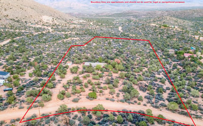 Boundary markings help illustrate the property s impressive size and open terrain. A perfect fit for those who want land, views, and the opportunity to build or expand on a spacious Hackberry parcel.