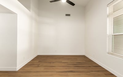 Flexible Scottsdale bonus room offering space for a home office, playroom, or creative studio. Modern flooring and neutral finishes provide a bright, adaptable space for many lifestyle needs.