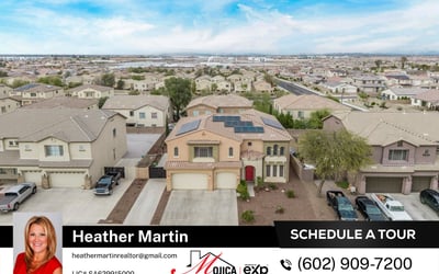 Drone perspective highlights the tile roof, 3-car garage, and solar energy system. This Glendale home offers impressive exterior design and energy-efficient features.
